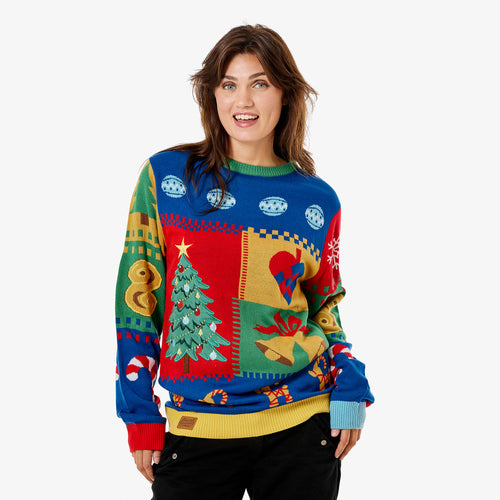 Mjuk och färgglad stickad jultröja för dam med färgpatchmönster och julmotiv från Svenskhusman.