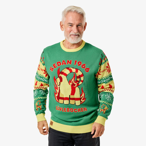 Grön stickad jultröja med Gävlebocken-motiv och texten 