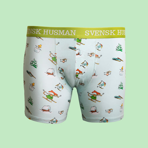 Ljusblå boxerkalsonger med mönster av Findus på skidor och grönt resårband från Svenskhusman.