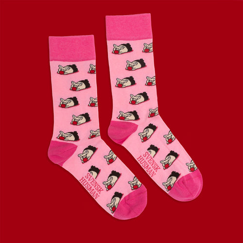 Rosa Socken med mönster av marsipangrisar samt mörkrosa häl och tå från Schwedischhusman.